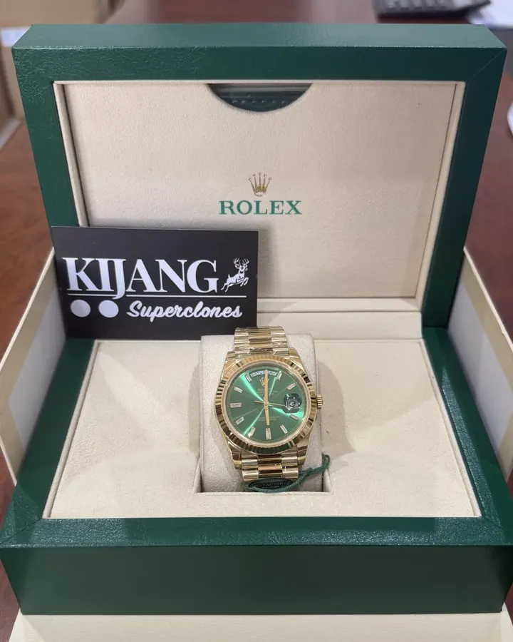 Day-Date Gold Green Baguette QC photo